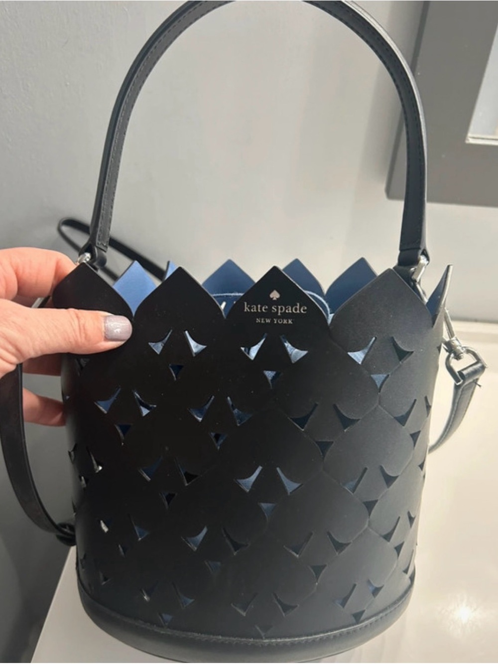 Kate Spade Black Leather Laser-Cut Bucket Bag like new only used one time.